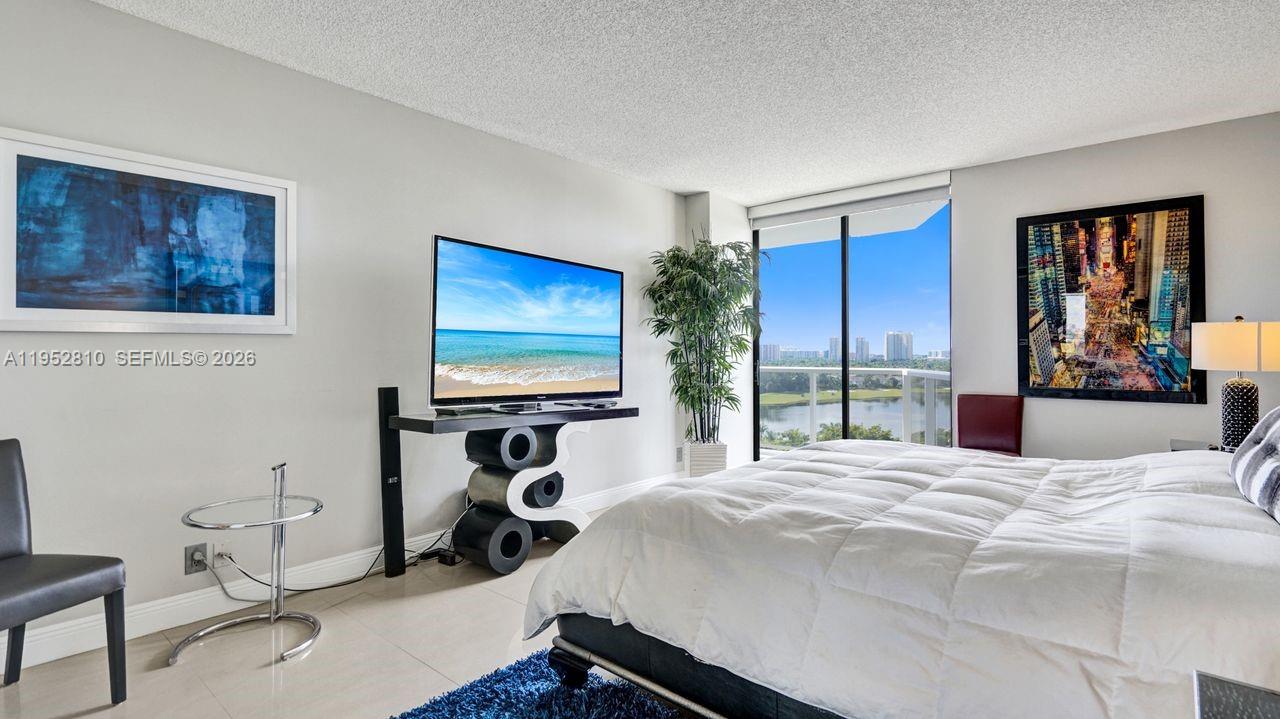 Photo of 20281 Country Club Dr  #809, Aventura, Florida, 33180 - Direct lake views.