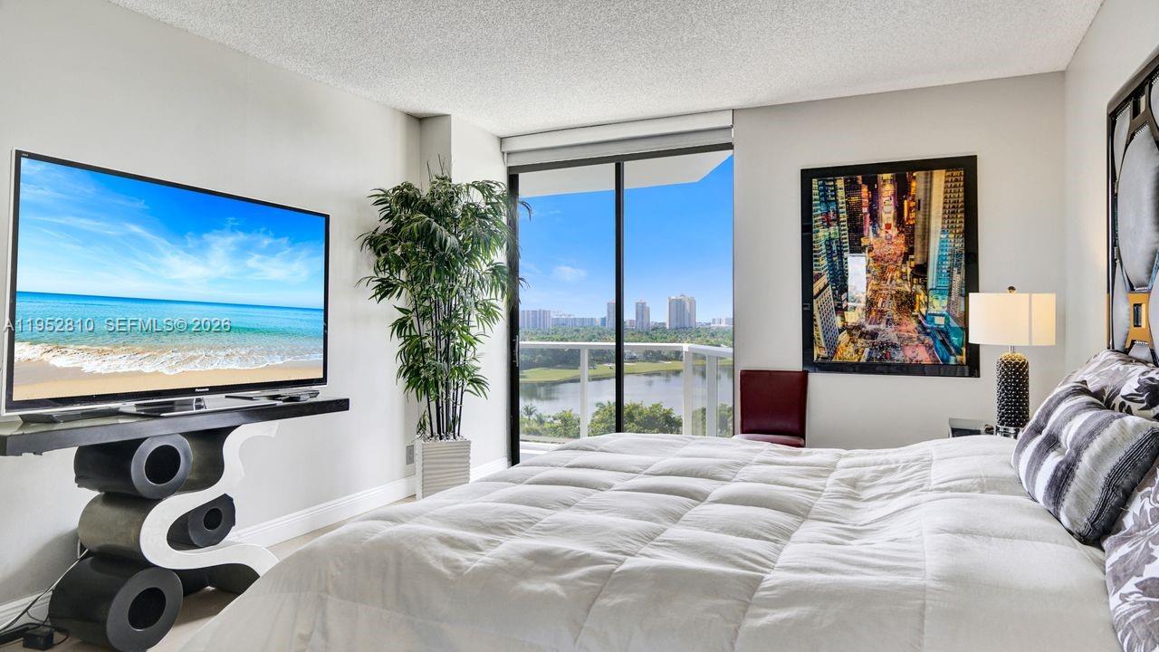 Photo of 20281 Country Club Dr  #809, Aventura, Florida, 33180 - Direct lake views.