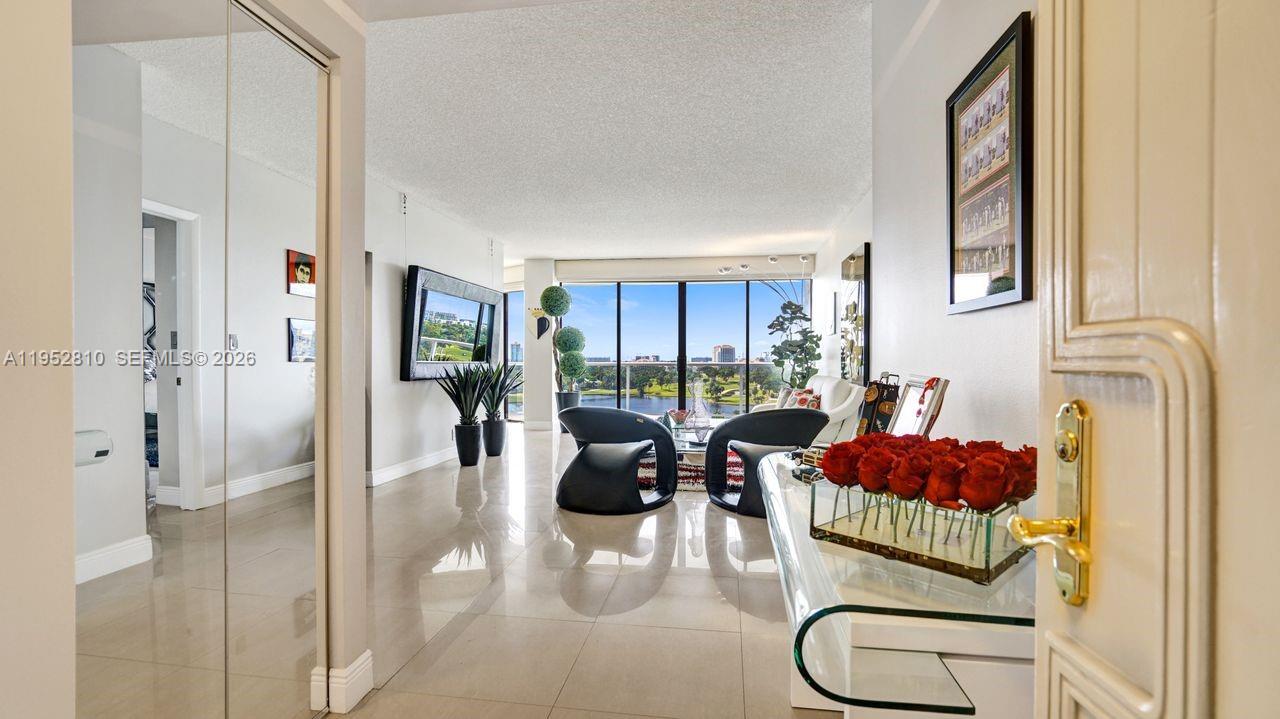 Photo of 20281 Country Club Dr  #809, Aventura, Florida, 33180 - The lake can be seen as soon as you enter the apartment.