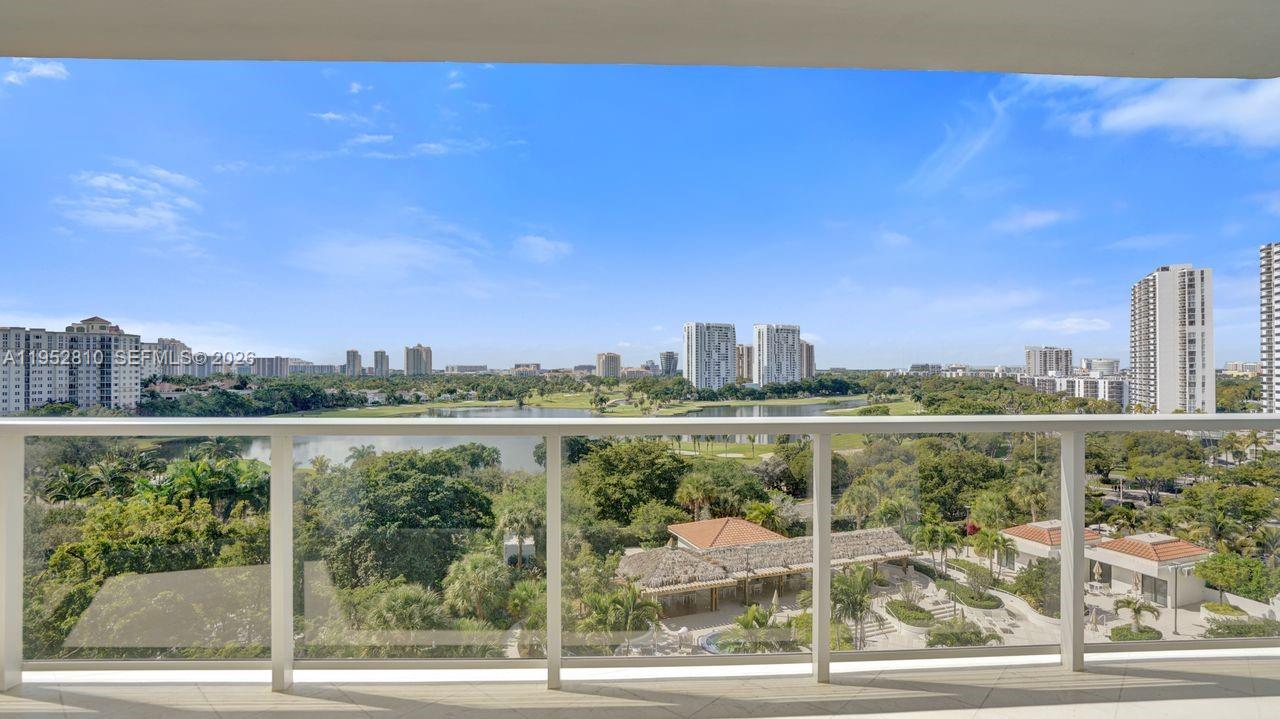 Photo of 20281 Country Club Dr  #809, Aventura, Florida, 33180 - Eye level lake views fraom the balcony.