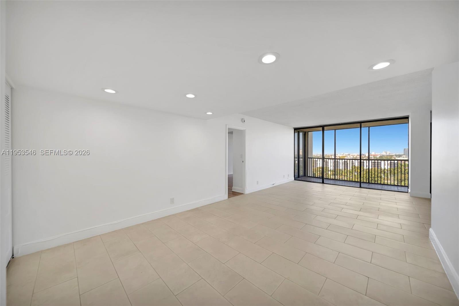 Photo of 20379 Country Club Dr  #1232, Aventura, Florida, 33180 - Dining Area with views to the Living Room and Balcony