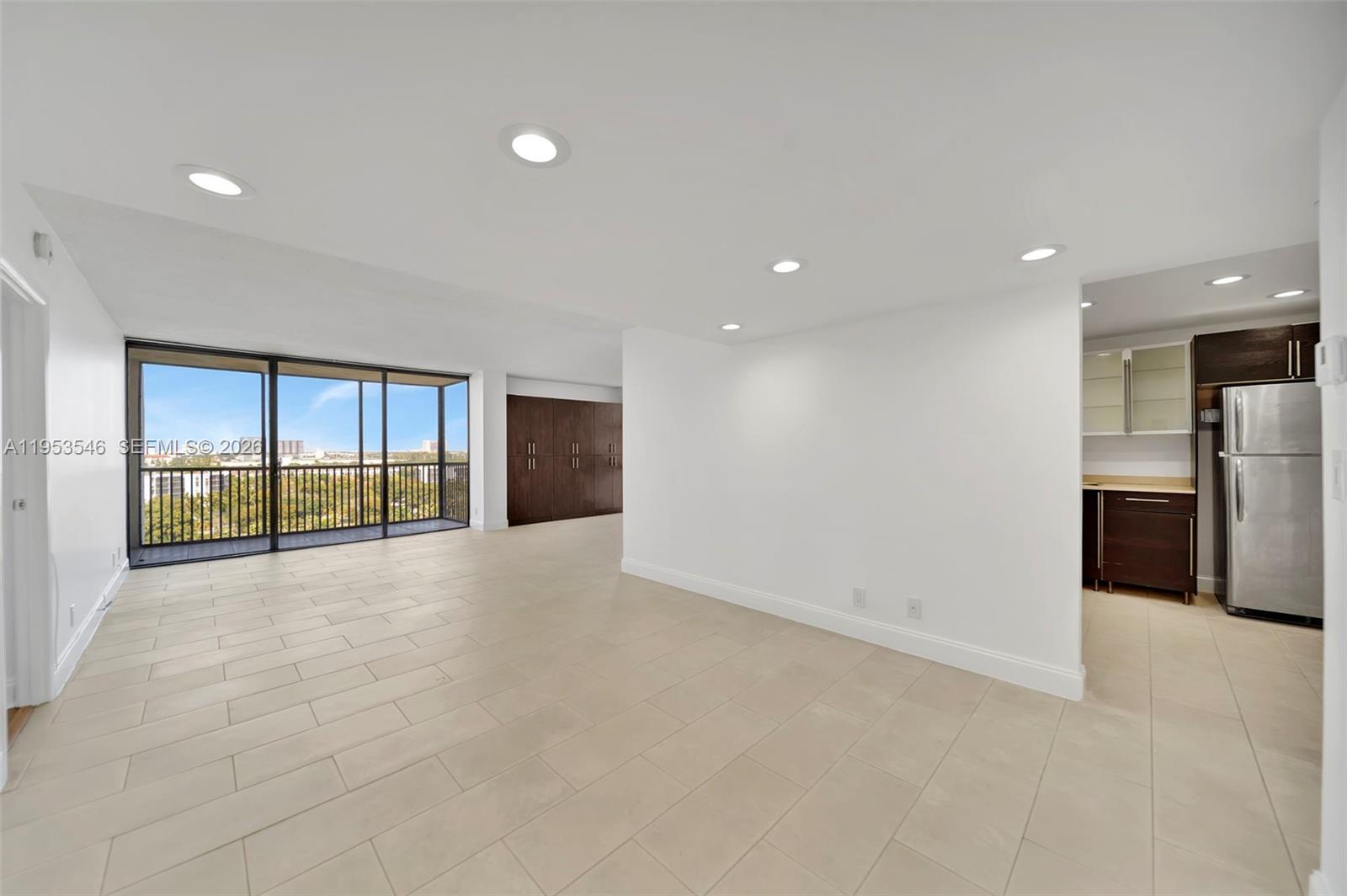 Photo of 20379 Country Club Dr  #1232, Aventura, Florida, 33180 - Dining Area with views to the Living Room and Balcony