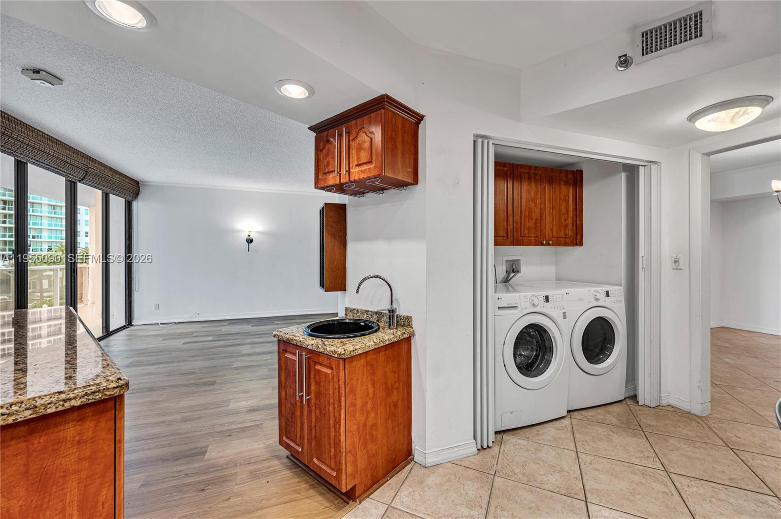 Photo of 20281 Country Club Dr  #210, Aventura, Florida, 33180 - Laundry near the kitchen