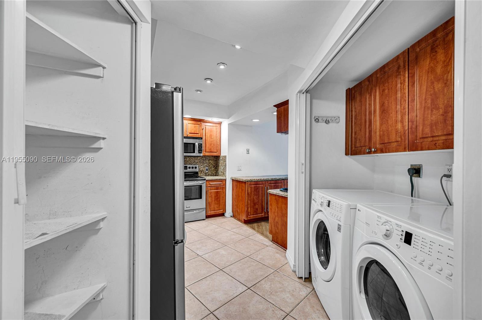 Photo of 20281 Country Club Dr  #210, Aventura, Florida, 33180 - laundry near kitchen