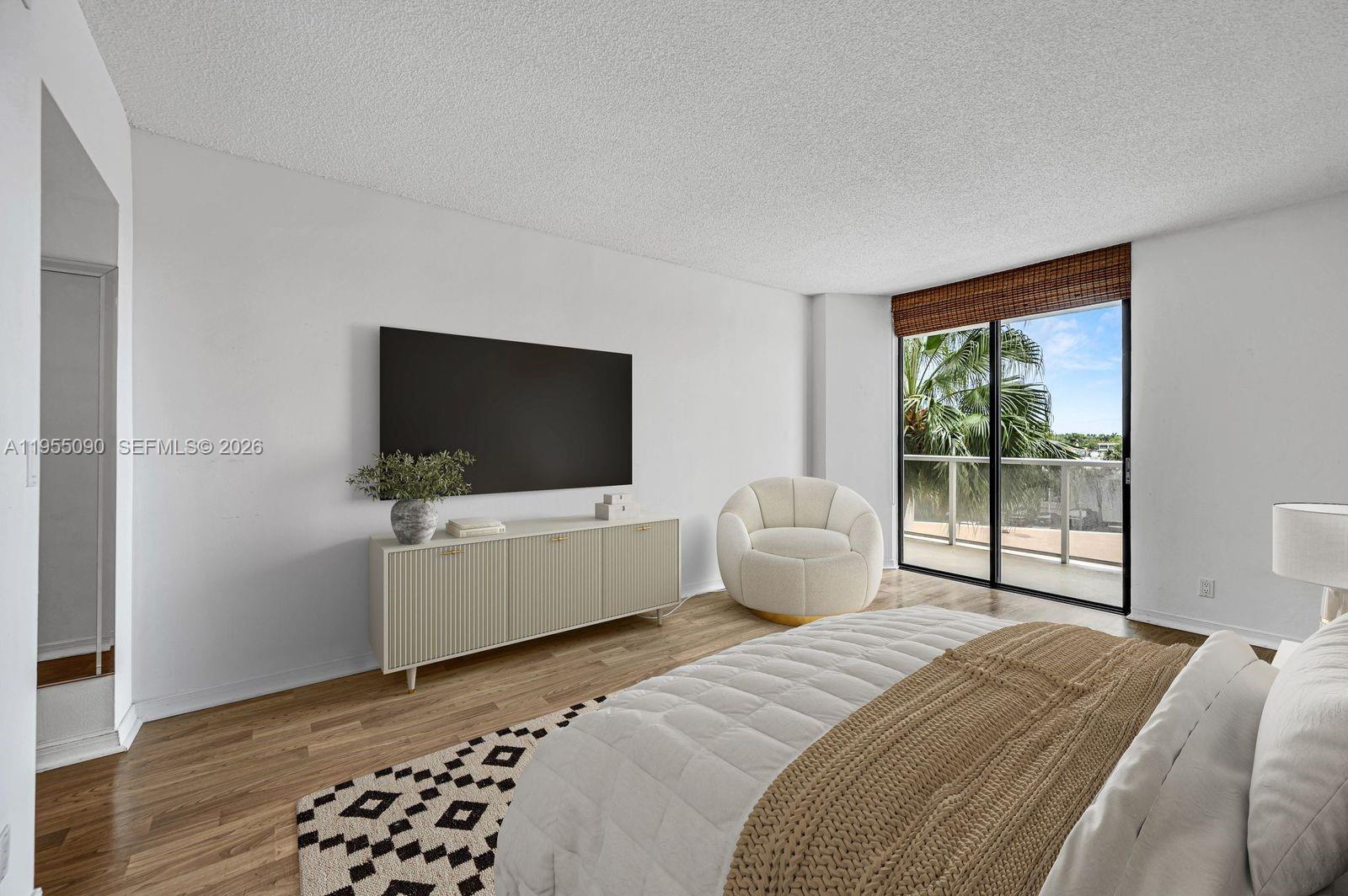 Photo of 20281 Country Club Dr  #210, Aventura, Florida, 33180 - Primary bedroom virtually staged