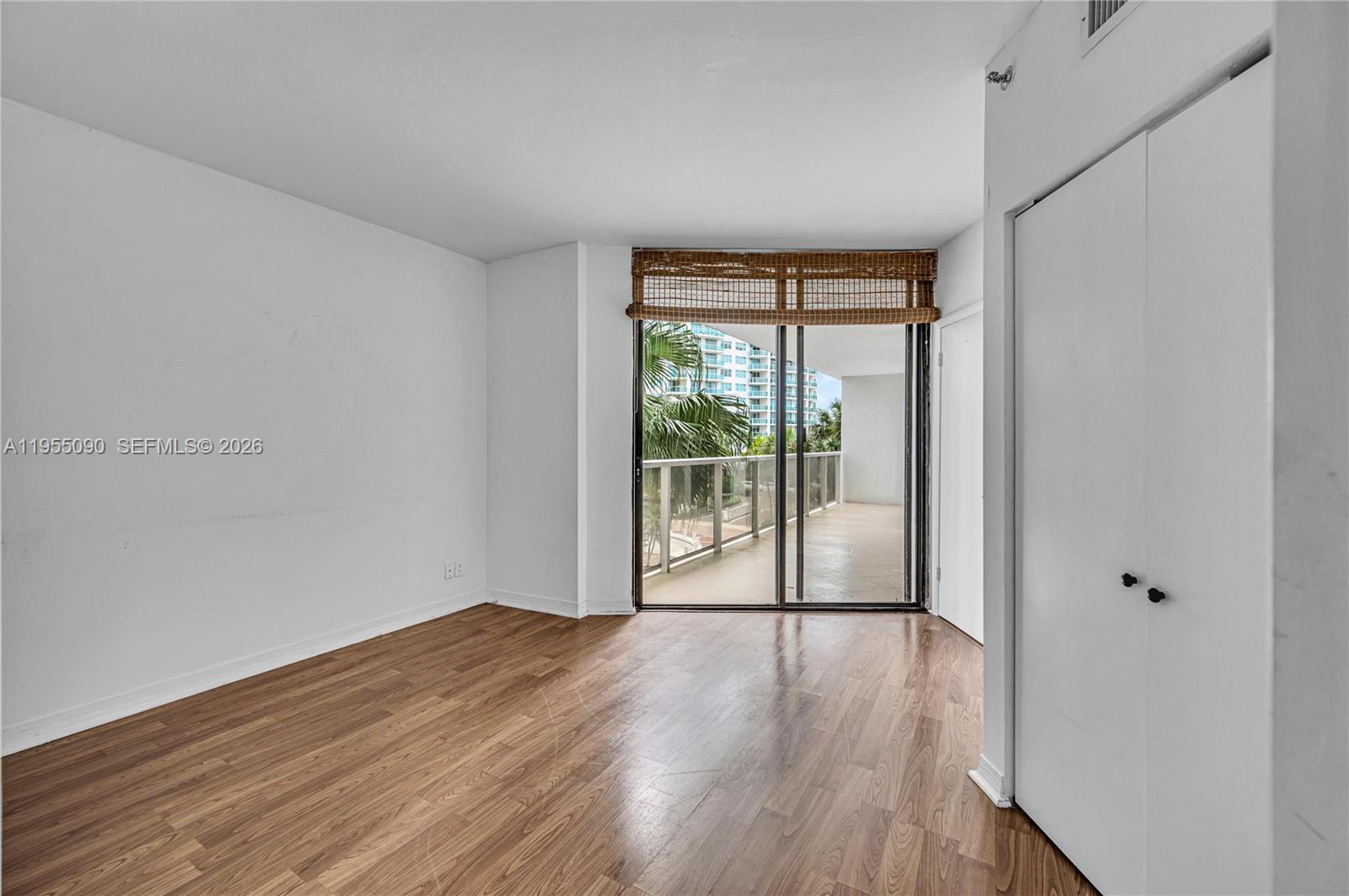 Photo of 20281 Country Club Dr  #210, Aventura, Florida, 33180 - second bedroom with terrace access