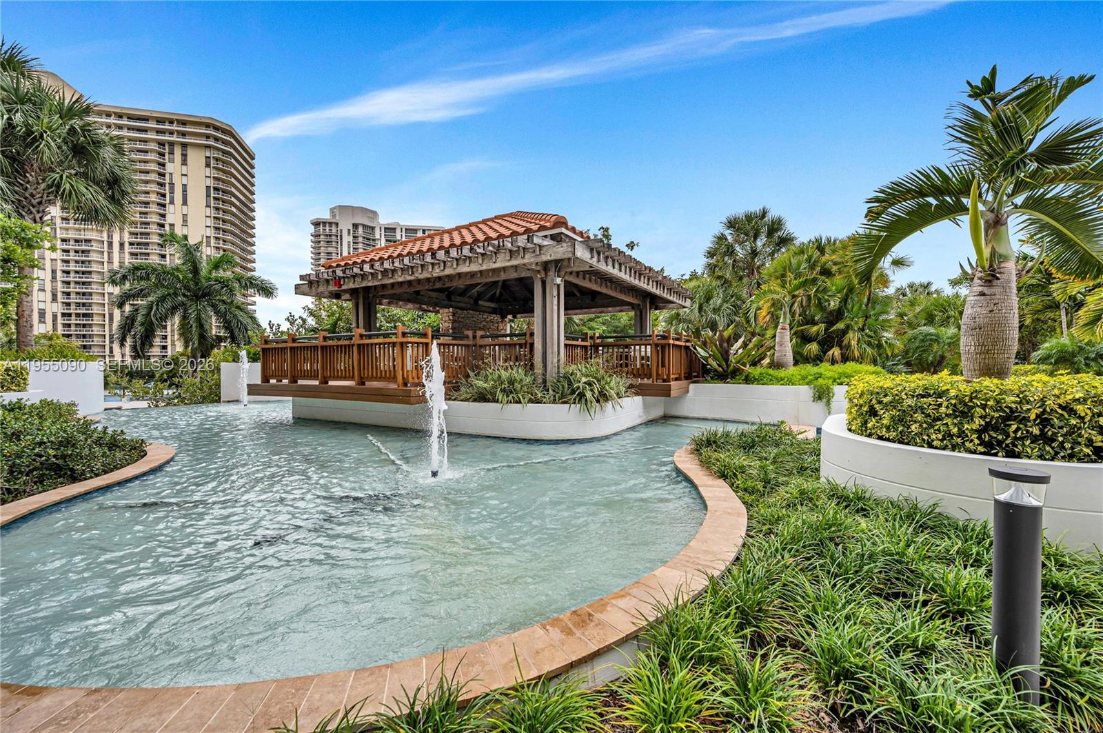 Photo of 20281 Country Club Dr  #210, Aventura, Florida, 33180 - water feature at the pool