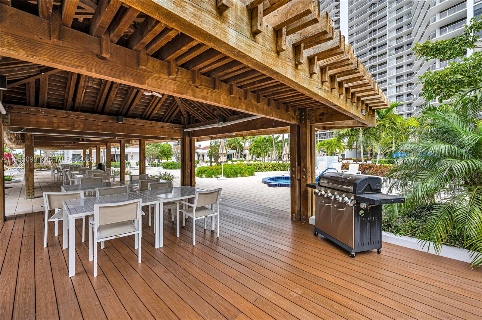 Photo of 20281 Country Club Dr  #210, Aventura, Florida, 33180 - barbeque at the pool