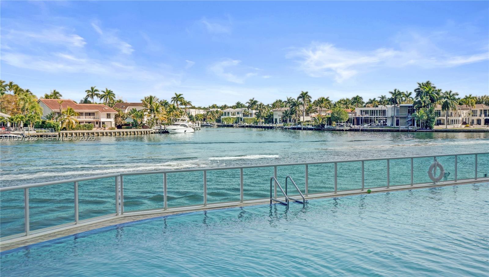 Photo of 20201 Country Club Dr  #1808, Aventura, Florida, 33180 - Infinity pool The manatees can be seen swimming close by.