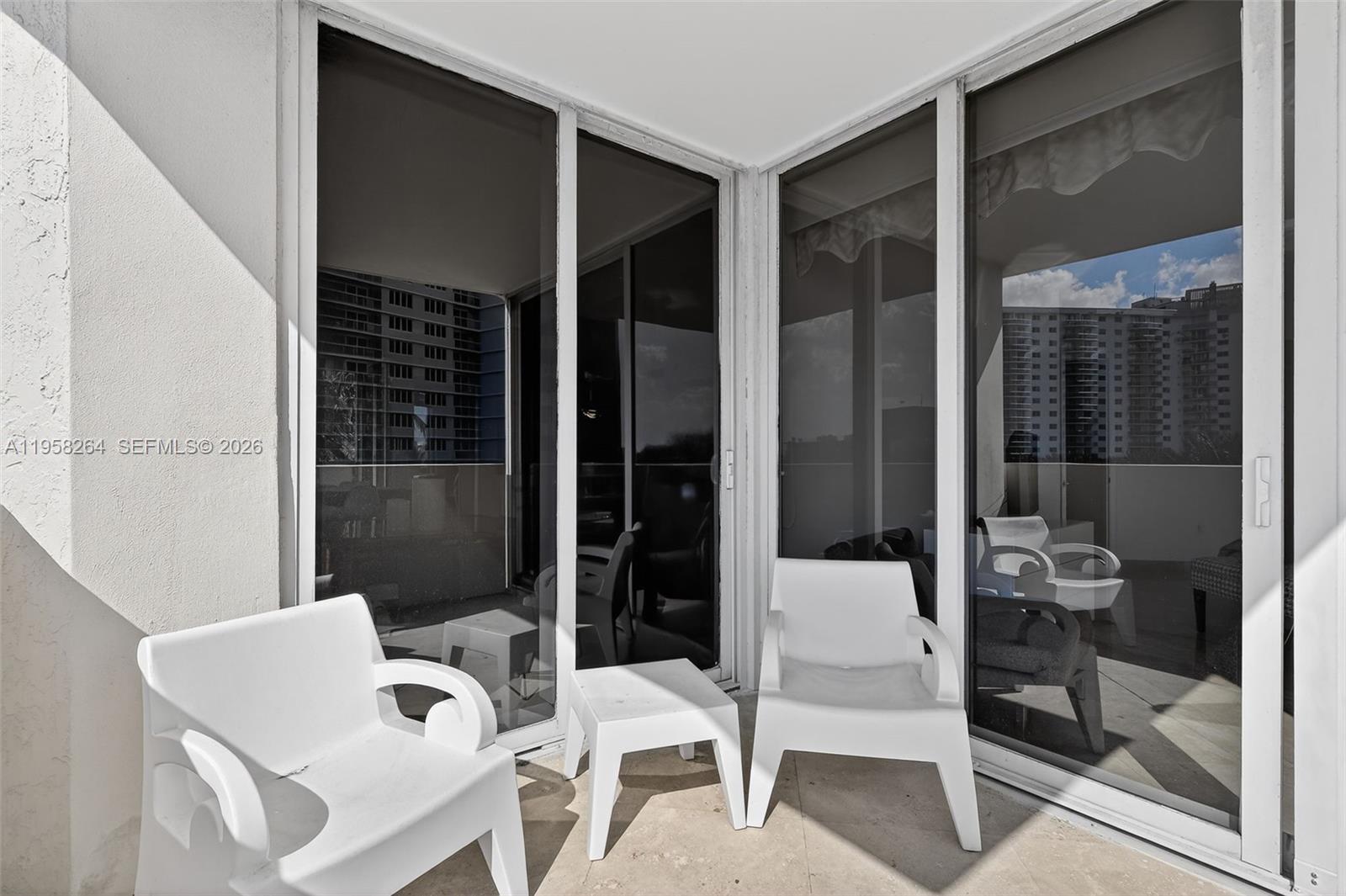 Photo of 19333 Collins Ave  #510, Sunny Isles Beach, Florida, 33160 - share balcony living room and master bedroom