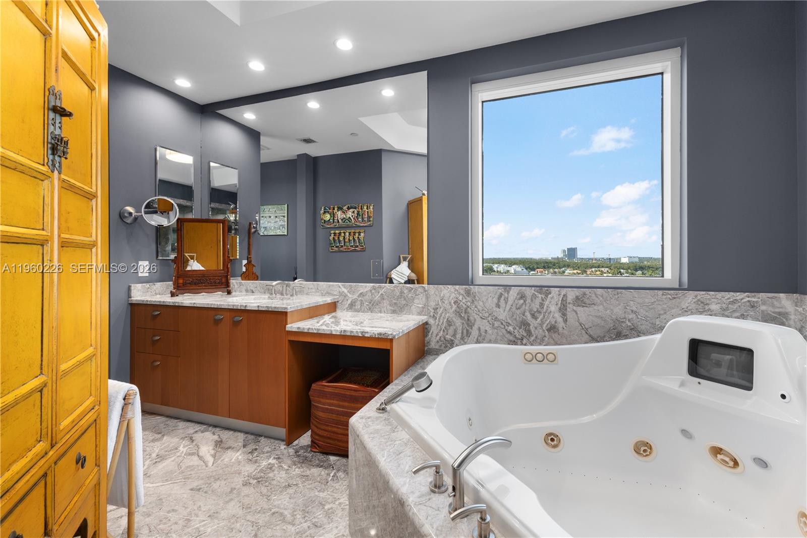 Photo of 16047 Collins Ave  #1001, Sunny Isles Beach, Florida, 33160 - One of two primary bathrooms.