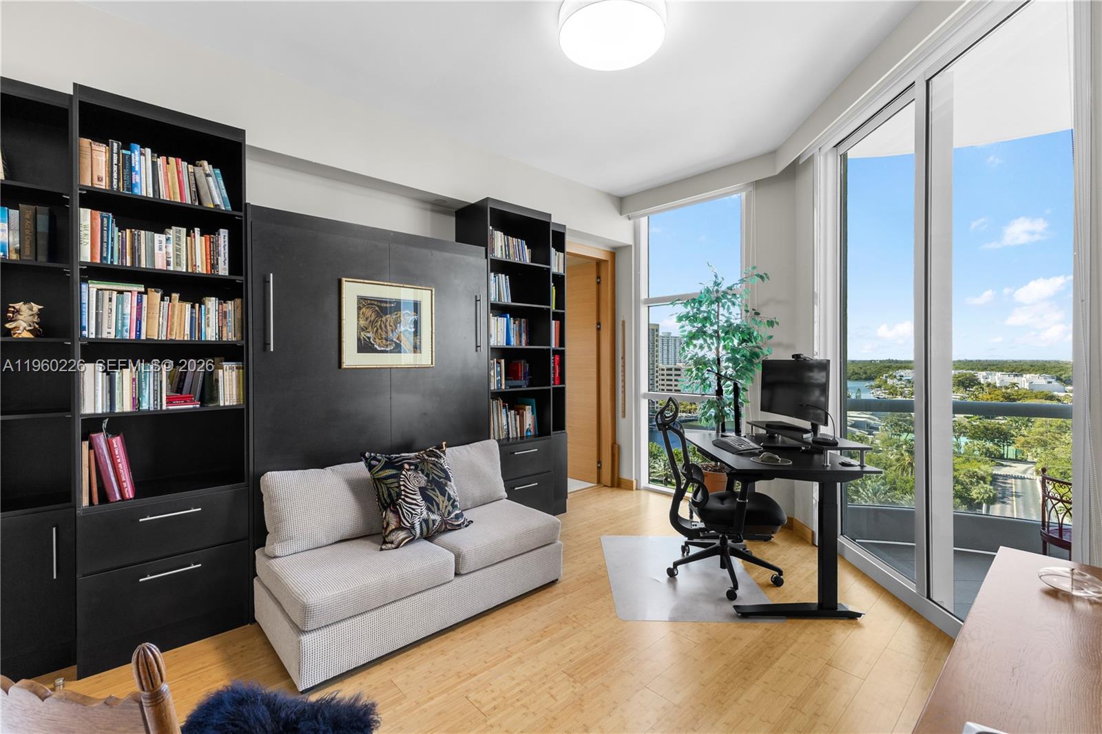 Photo of 16047 Collins Ave  #1001, Sunny Isles Beach, Florida, 33160 - First Guest/Office bed room with pull down murphy bed.