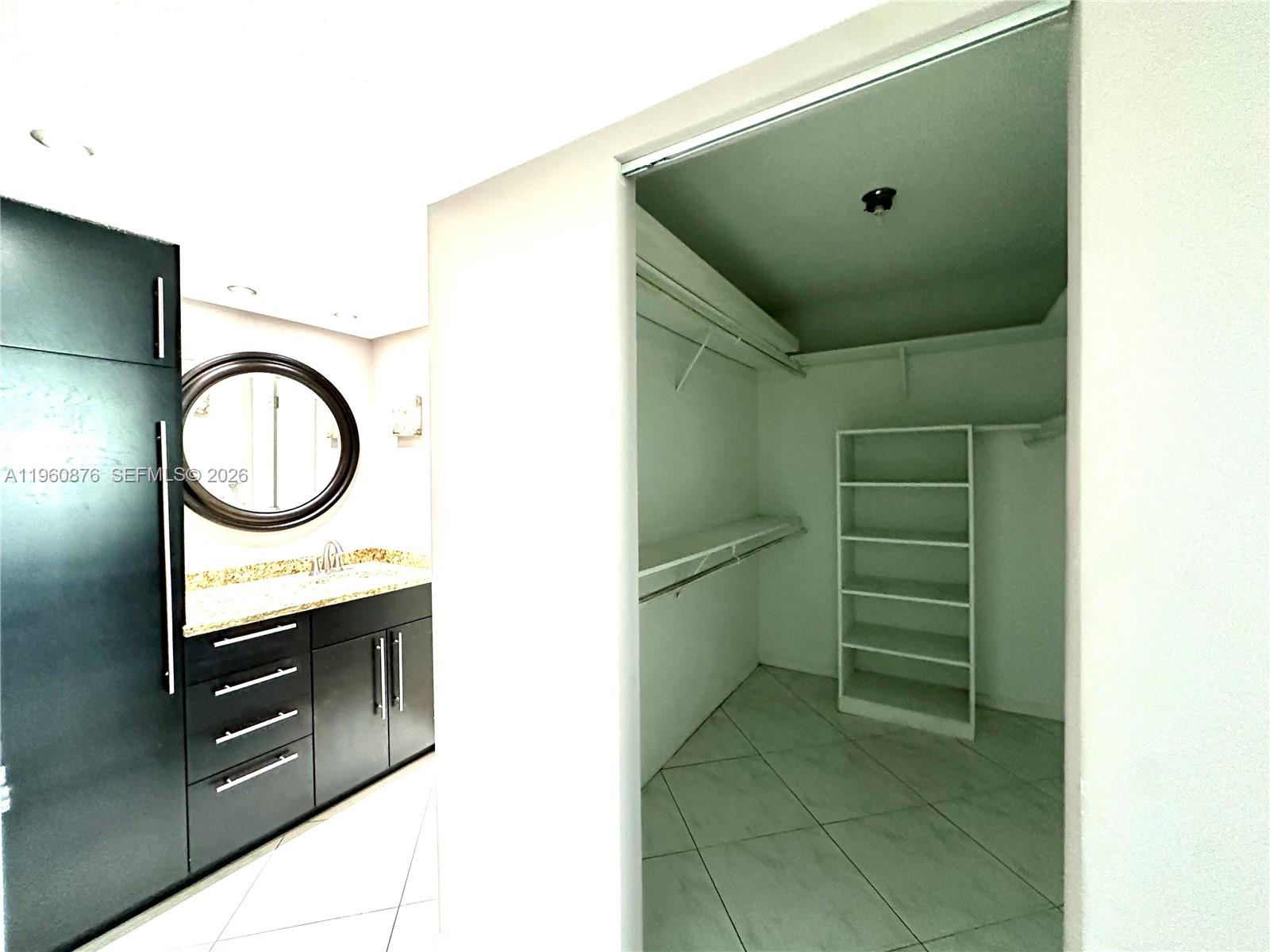 Photo of 1904 Ocean Dr  #701, Hallandale Beach, Florida, 33009 - Master Bathroom and Walking Closet