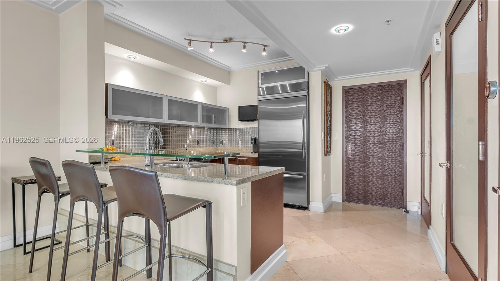 Photo of 16275 Collins Ave  #903, Sunny Isles Beach, Florida, 33160 - Island w/ Bar Stools