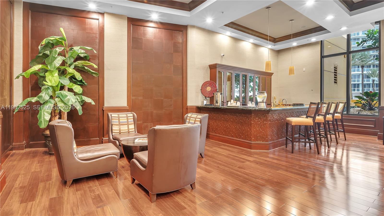 Photo of 16275 Collins Ave  #903, Sunny Isles Beach, Florida, 33160 - Social Room w/ Fresh Coffee & Fruit Water Daily