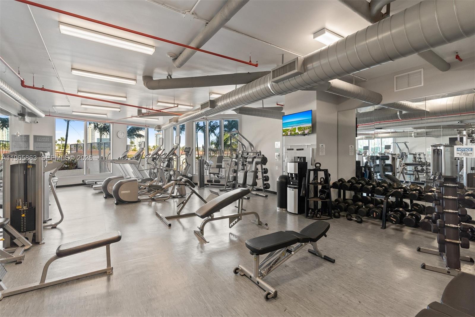 Photo of 3029 188th St #1019, Aventura, Florida, 33180 - Spacious Fitness Center overlooking Pool Deck