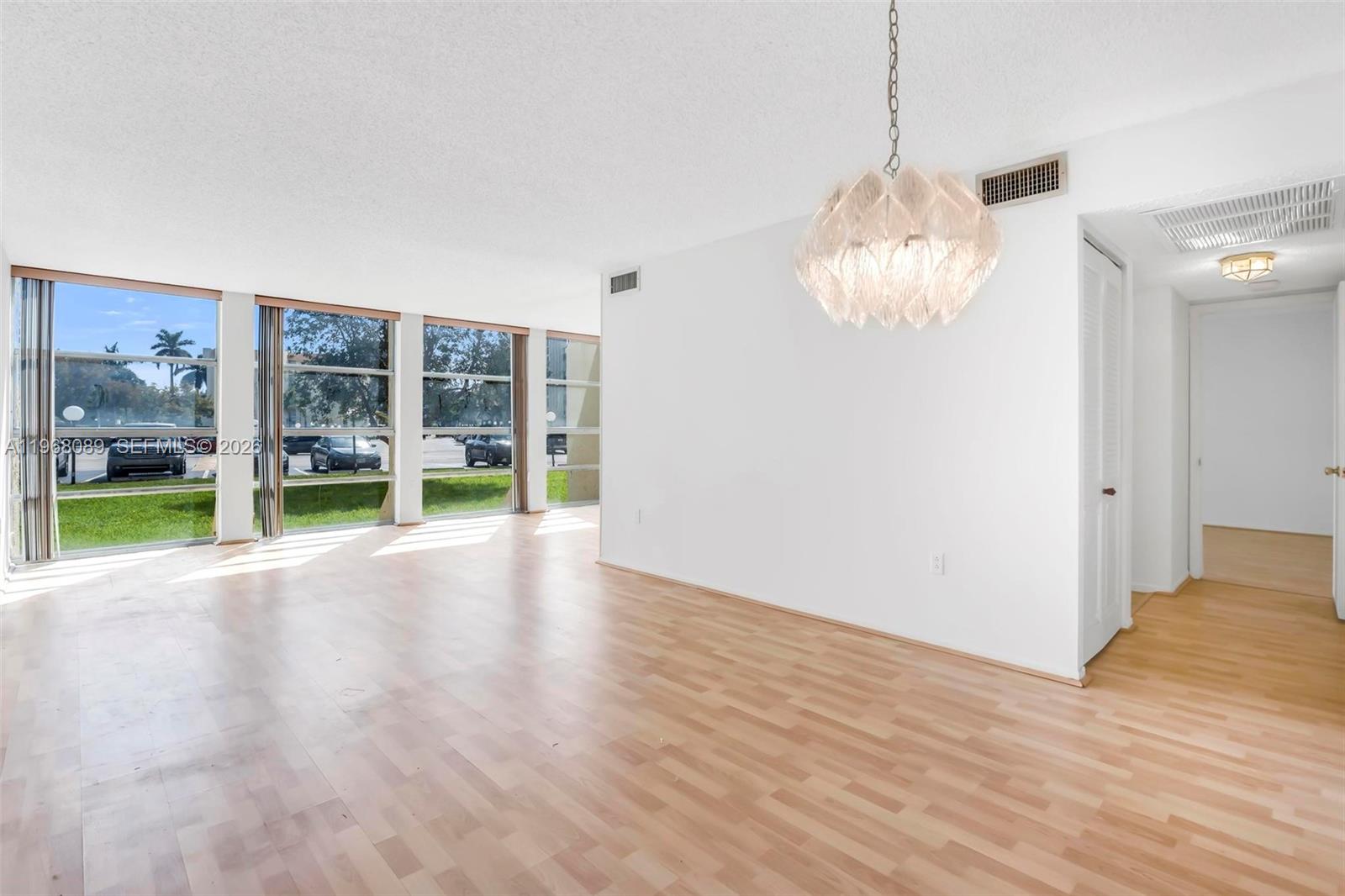 Photo of 801 Three Islands Blvd #111, Hallandale Beach, Florida, 33009 - Dining/Living/Hall Area