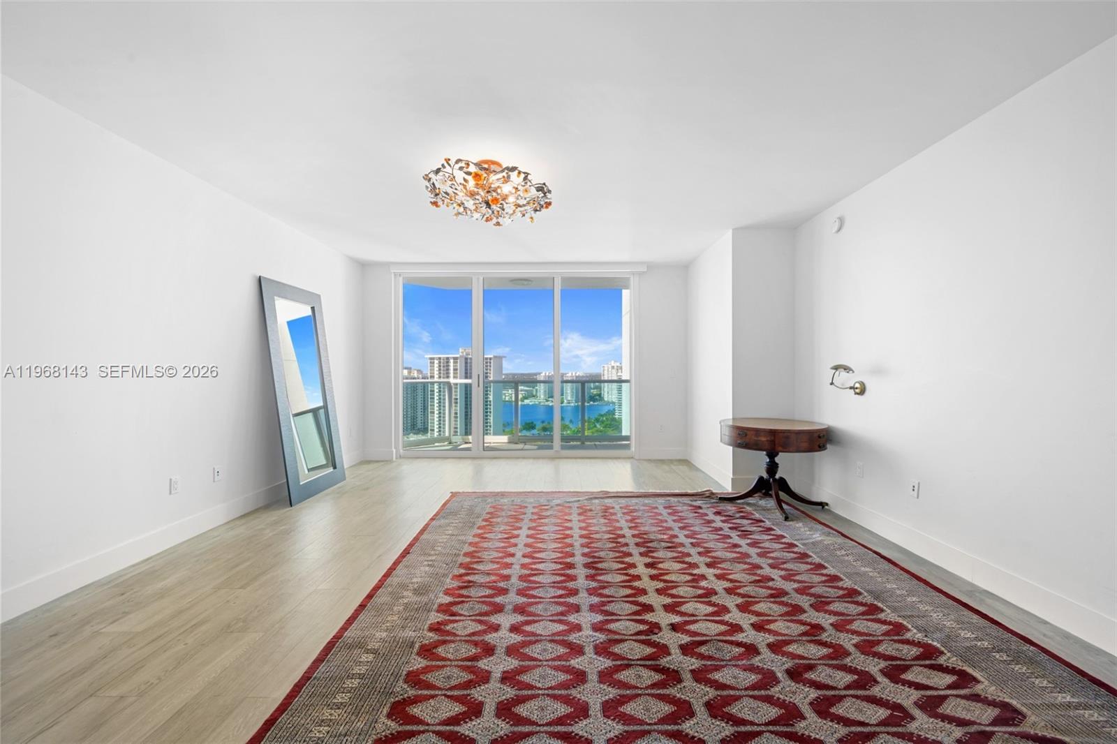 Photo of 3301 183  #2209, Aventura, Florida, 33160 - Principal bedroom is spacious with two closets, and an ample gorgeous bath