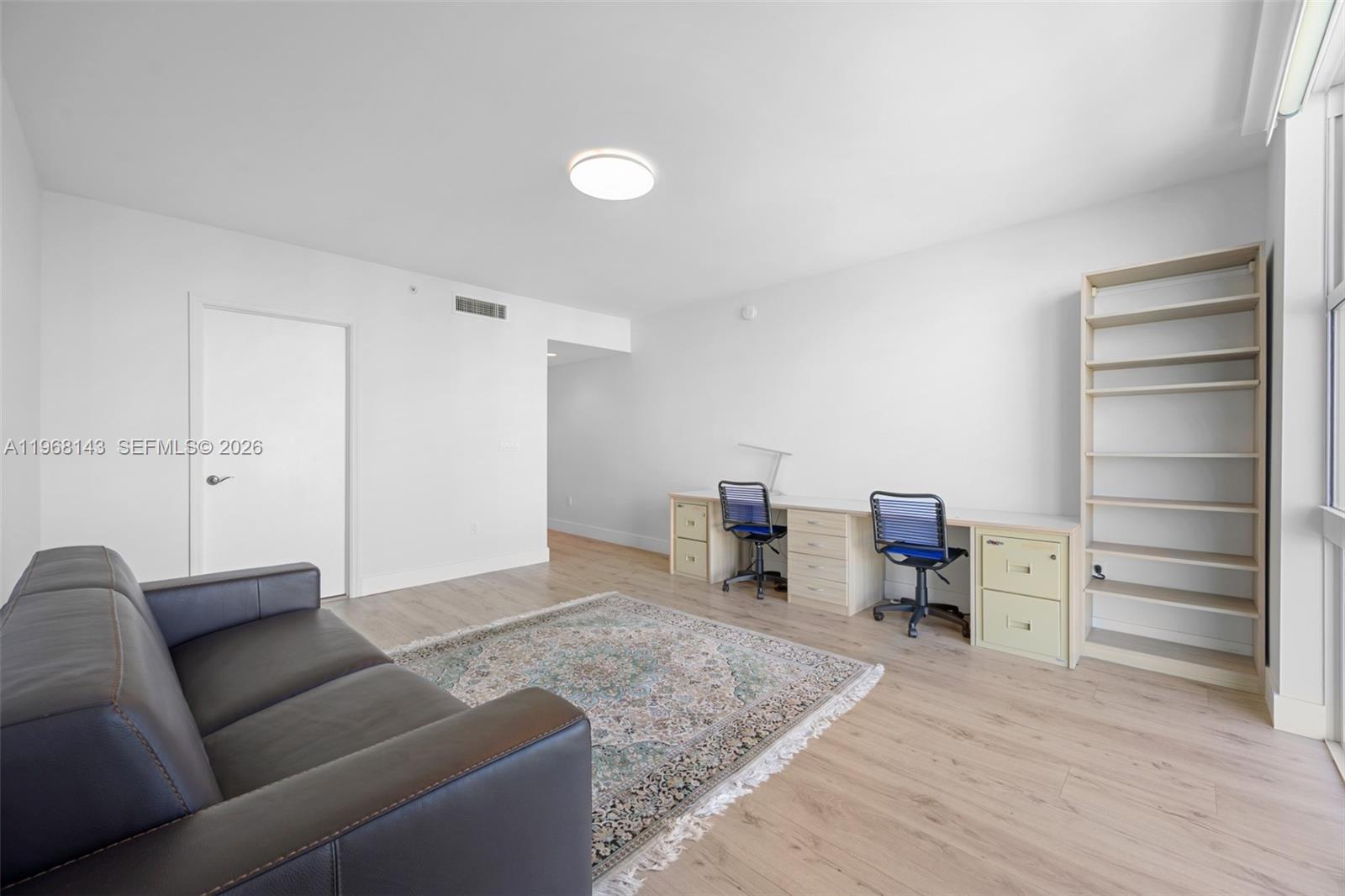 Photo of 3301 183  #2209, Aventura, Florida, 33160 - This ample bedroom boasts a private bathroom and access to the balcony.  Floor to ceilings windows, sliding glass doors, and so much more.