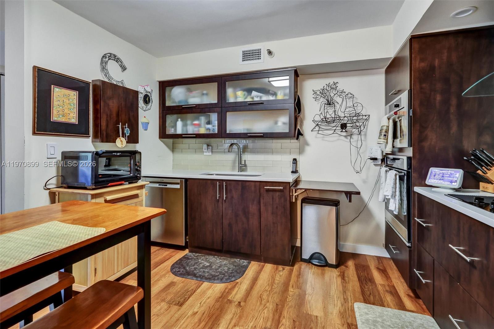 Photo of 3500 Mystic Pointe Dr  #302, Aventura, Florida, 33180 - Functional and well-designed with an eat-in area, ideal for casual dining and everyday convenience.