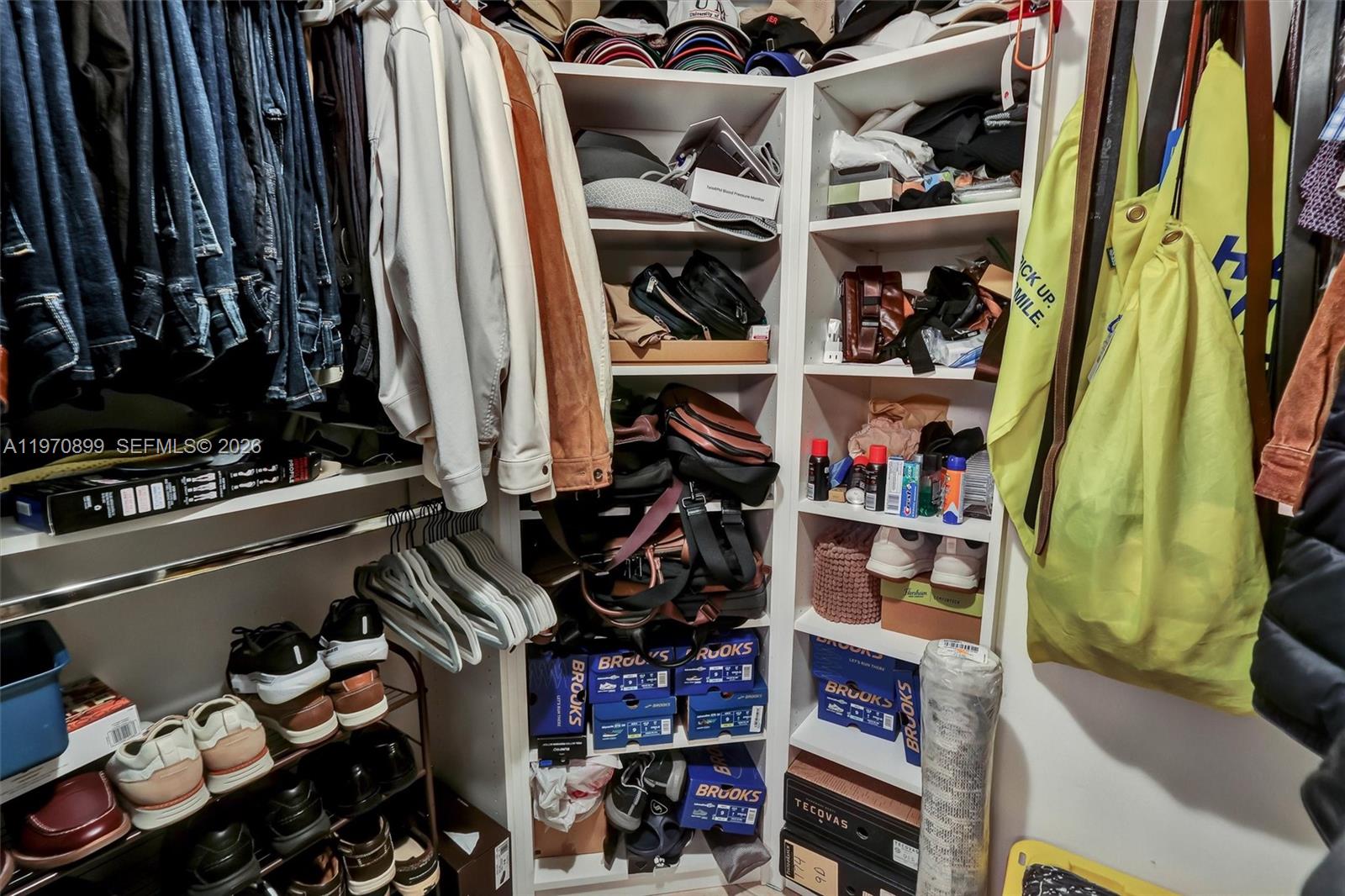 Photo of 3500 Mystic Pointe Dr  #302, Aventura, Florida, 33180 - Custom built-ins provide excellent organization and maximize storage space.