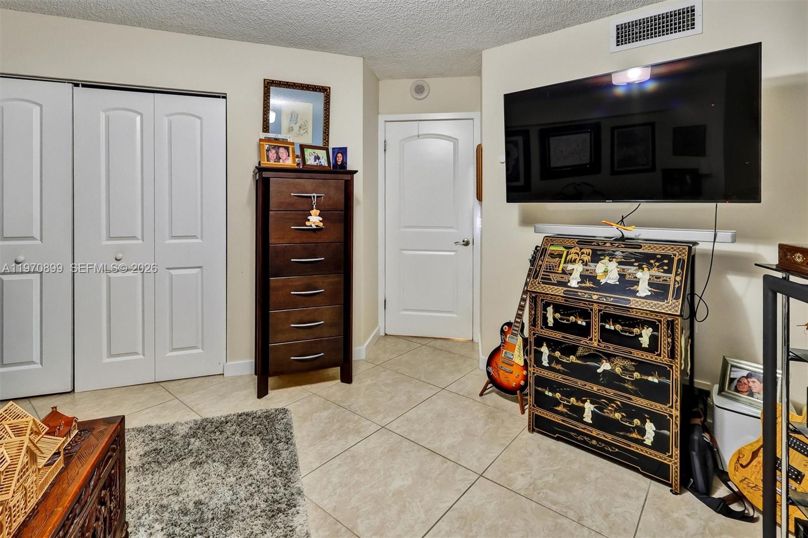 Photo of 3500 Mystic Pointe Dr  #302, Aventura, Florida, 33180 - Second Bedroom - Spacious and versatile; perfect as a guest bedroom, home office, or creative studio.