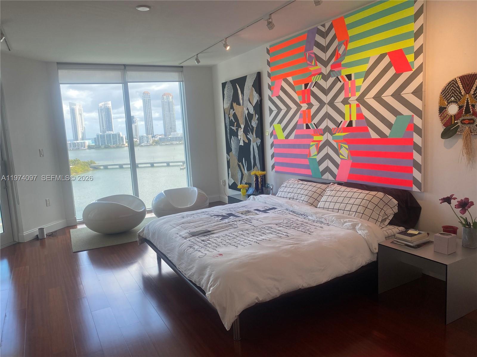 Photo of 3201 183  #1104, Aventura, Florida, 33160 - Principal Bedroom with a viewing area.