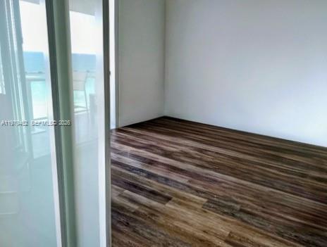 Photo of 2030 Ocean Dr #1614, Hallandale Beach, Florida, 33009 - third bedroom with glass partition sliding door, walk-in closet and direct ocean views