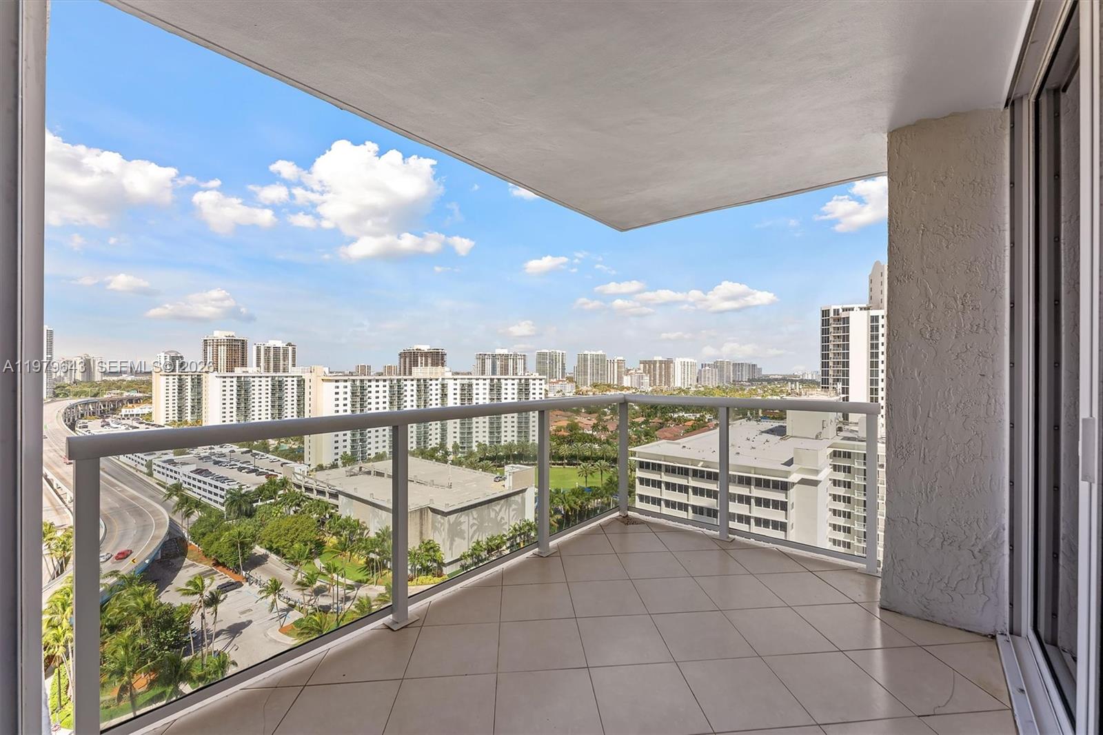 Photo of 19111 Collins Ave #1703, Sunny Isles Beach, Florida, 33160 - Balcony off Kitchen and Dining room