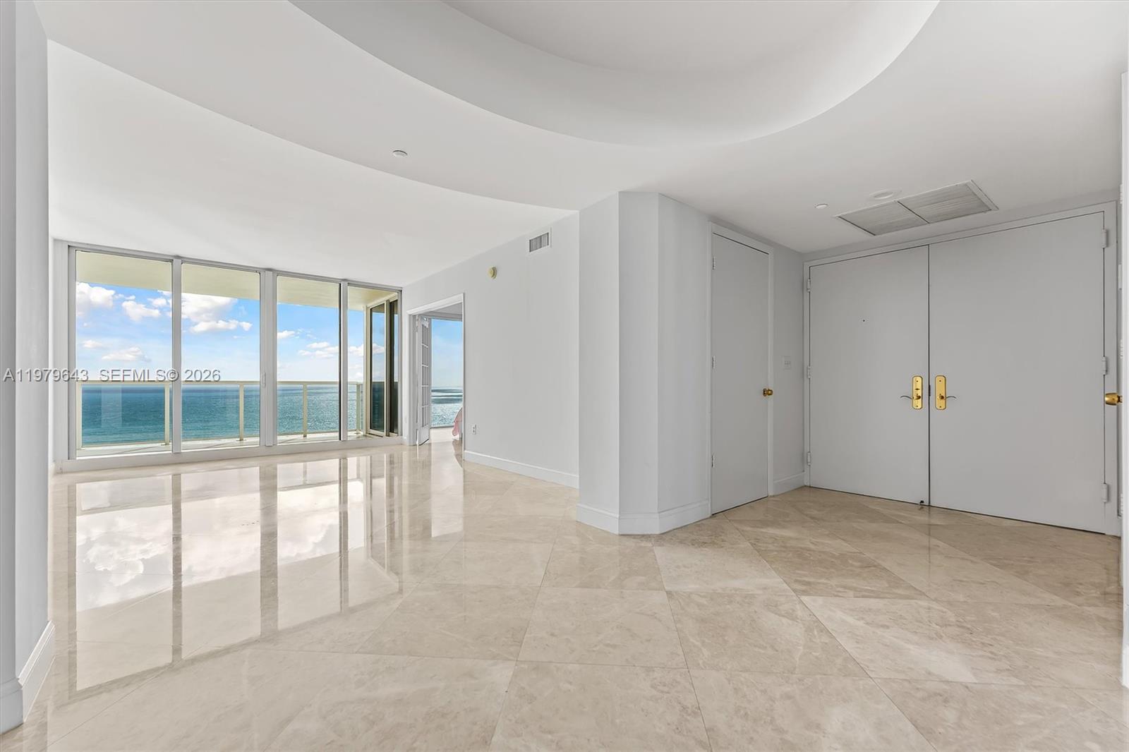 Photo of 19111 Collins Ave #1703, Sunny Isles Beach, Florida, 33160 - Entrance - Living room on the right side