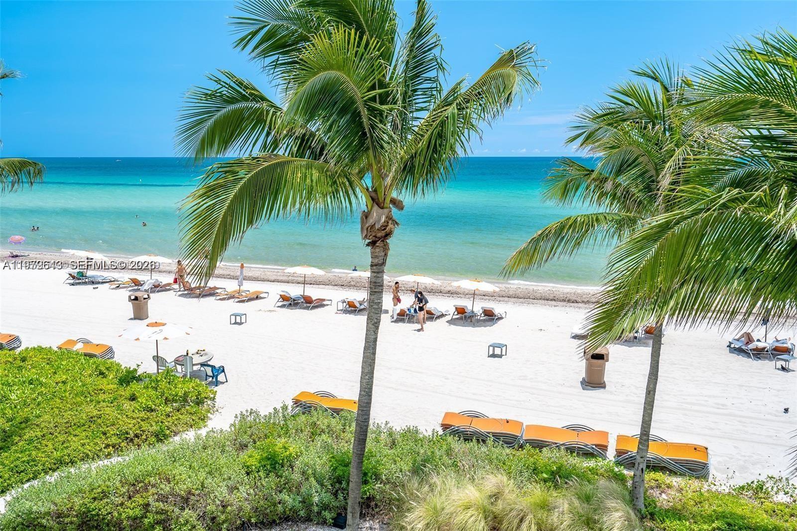 Photo of 19111 Collins Ave #1703, Sunny Isles Beach, Florida, 33160 - View to the beach from the pool area