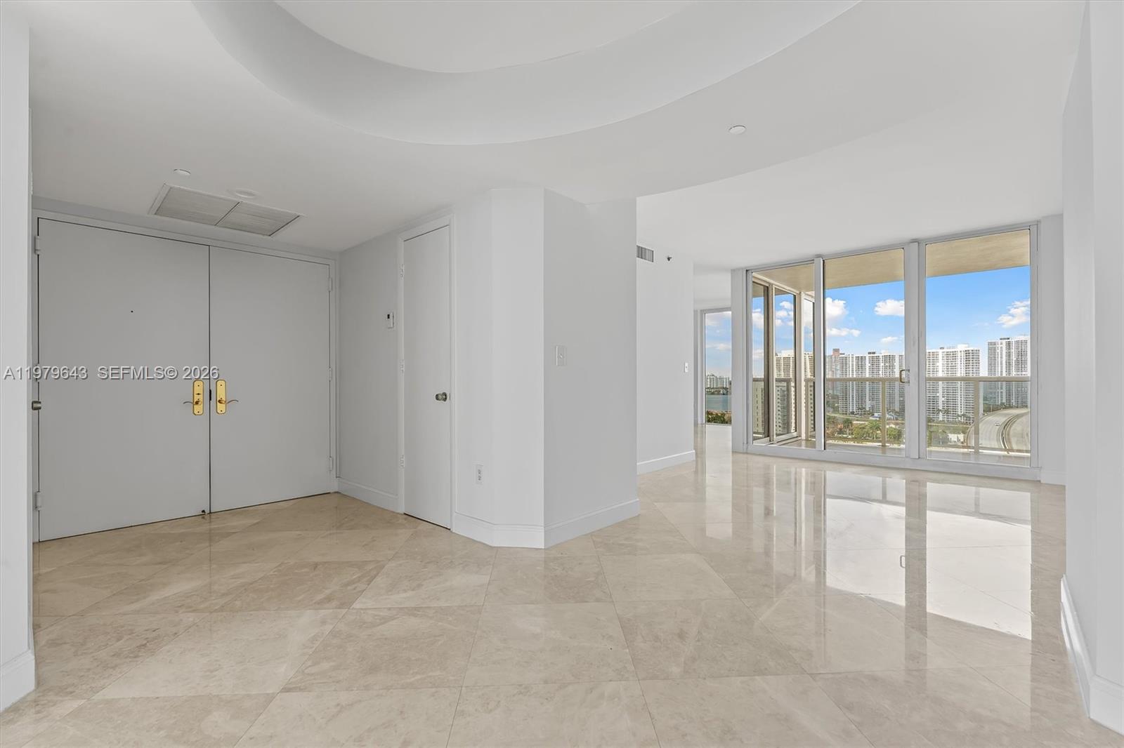 Photo of 19111 Collins Ave #1703, Sunny Isles Beach, Florida, 33160 - Entrance - Dining Room on the left side