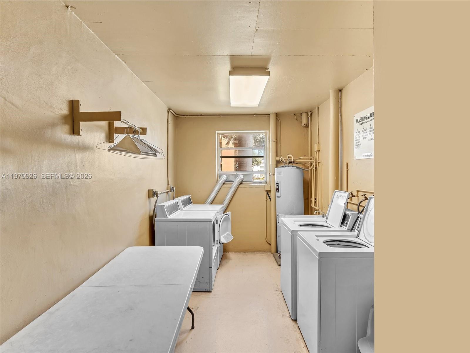 Photo of 610 12th Ave  #203, Hallandale Beach, Florida, 33009 - Two Laundry Rooms on the second floor.