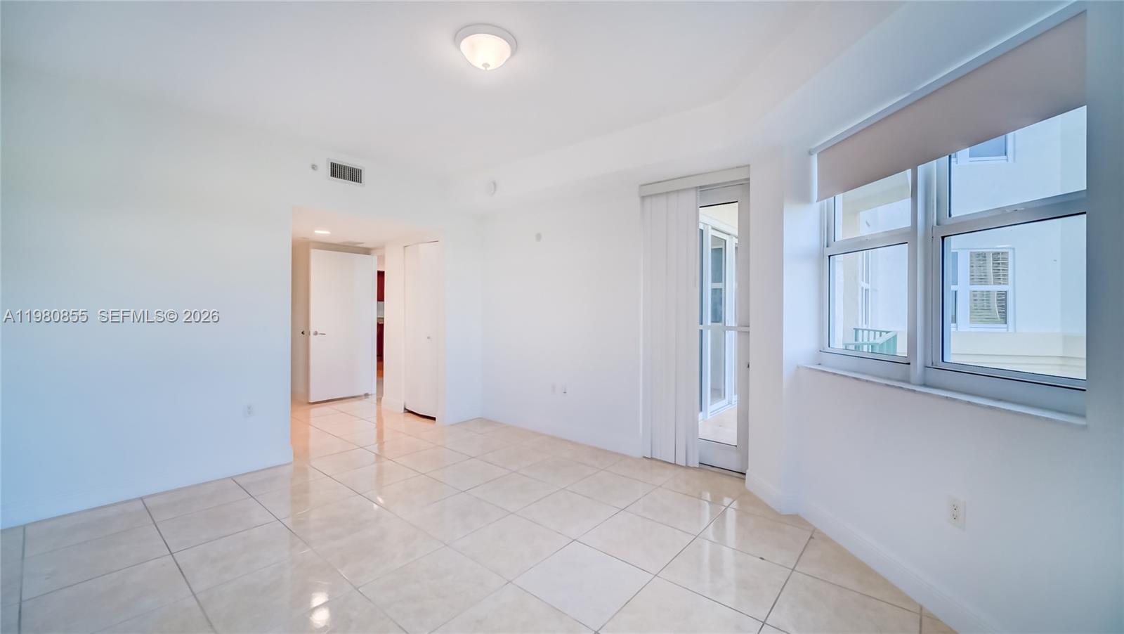 Photo of 20000 Country Club Dr  #512, Aventura, Florida, 33180 - Master Bedroom. Direct access to balcony