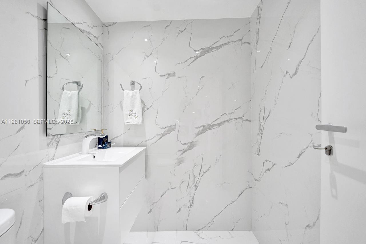 Photo of 20281 Country Club Dr  #2209, Aventura, Florida, 33180 - Guest bathroom.