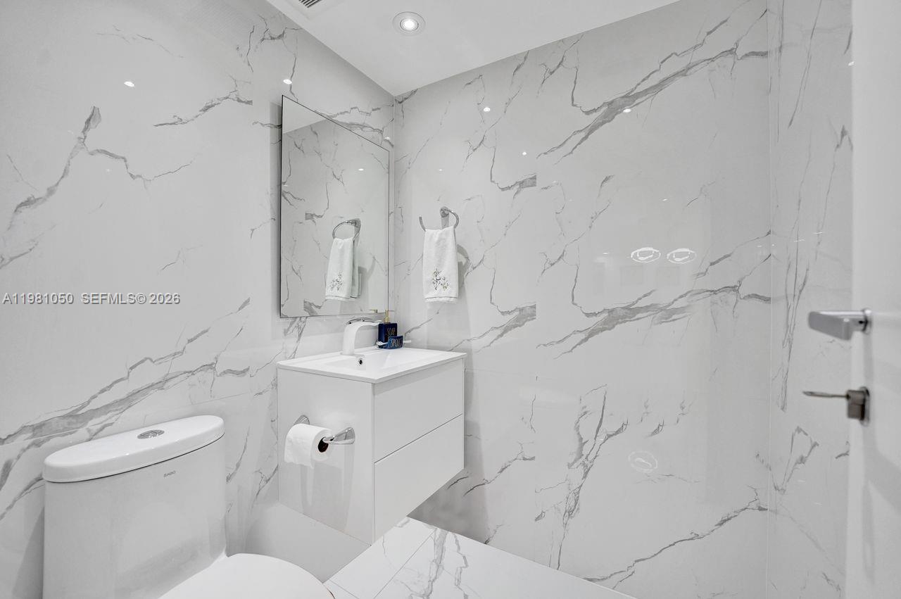 Photo of 20281 Country Club Dr  #2209, Aventura, Florida, 33180 - Guest bathroom.