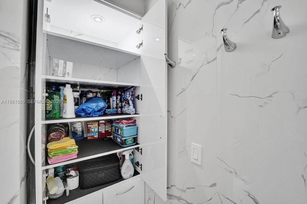 Photo of 20281 Country Club Dr  #2209, Aventura, Florida, 33180 - Extra storage in the bathroom.