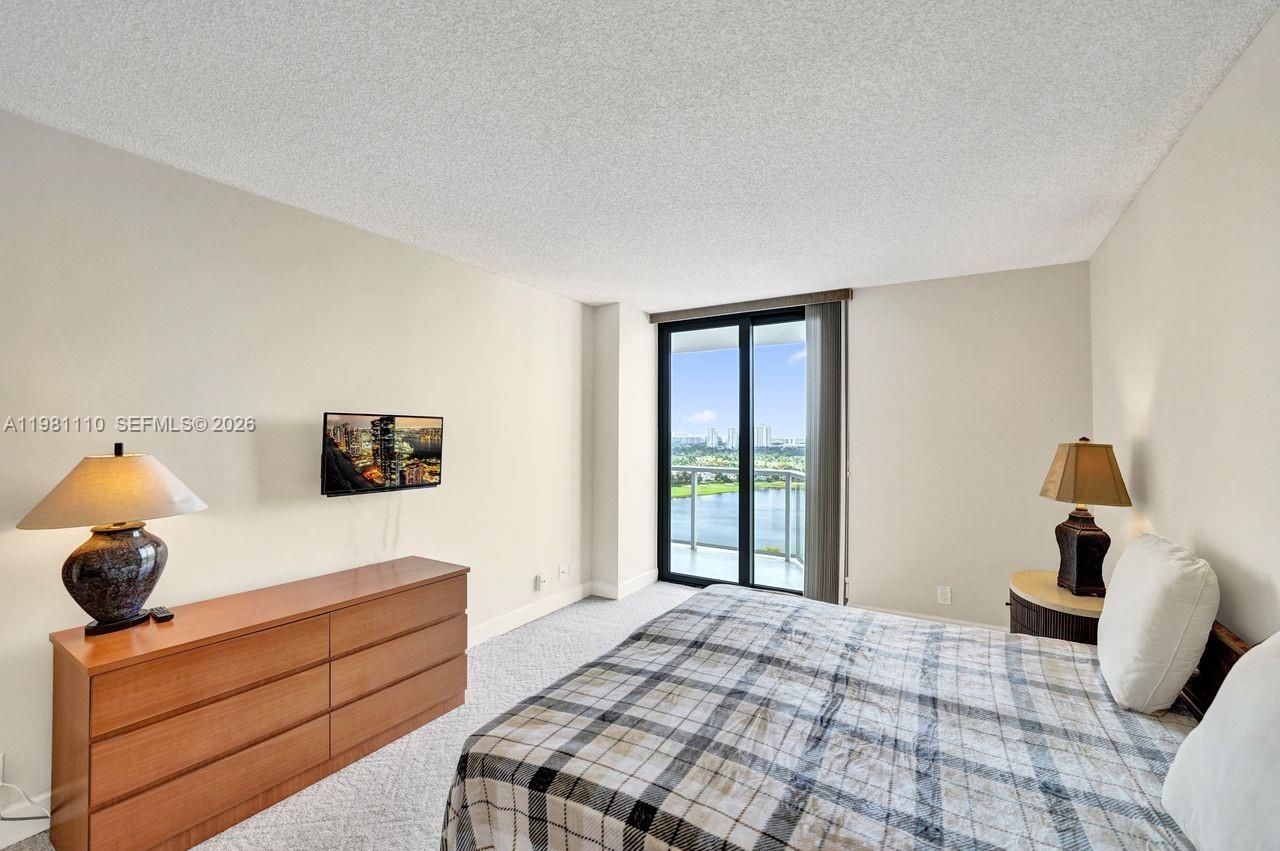 Photo of 20281 Country Club Dr  #1703, Aventura, Florida, 33180 - Direct lake views.