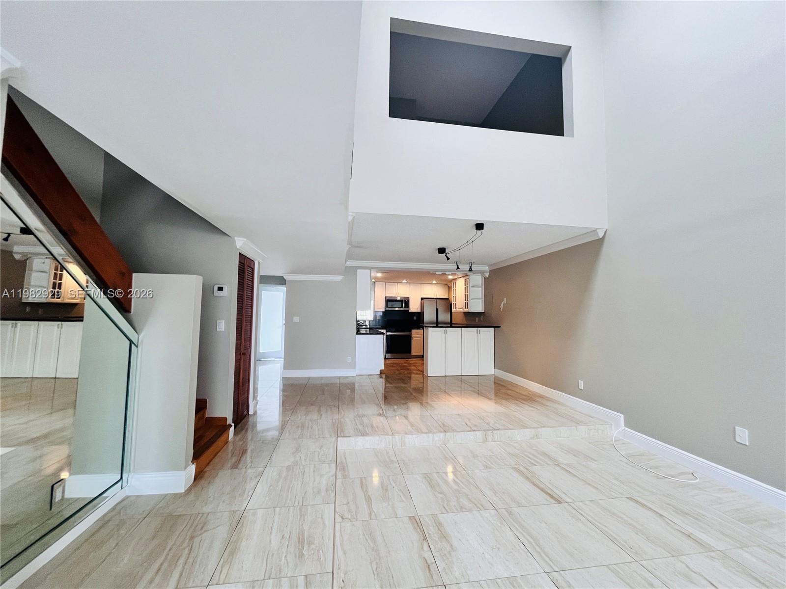 Photo of 253 Poinciana Dr  (253), Sunny Isles Beach, Florida, 33160 - LIVING AREA / DINING AREA