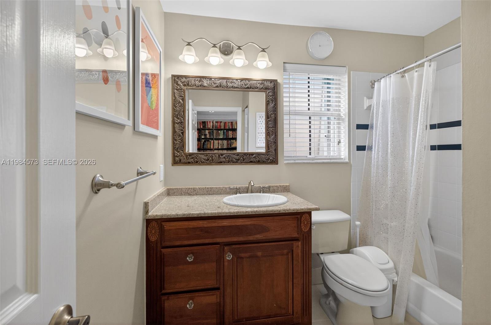 Photo of 1860 Sweetbay Way  (1860), Hollywood, Florida, 33019 - Bathroom between Guest Bedroom 1 & 2