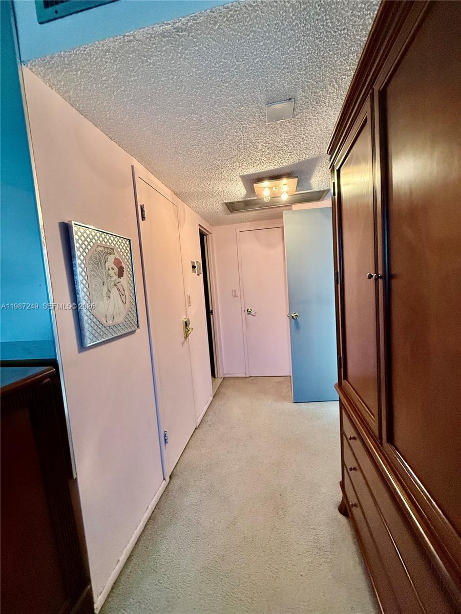 Photo of 3180 Ocean Dr  #509, Hallandale Beach, Florida, 33009 - Hallway between Master Bedroom & Master Bath