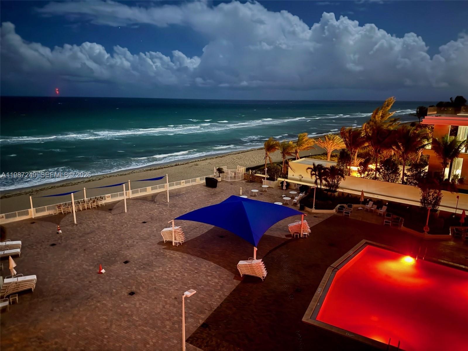 Photo of 3180 Ocean Dr  #509, Hallandale Beach, Florida, 33009 - Pool at night w/ Turtle Lights