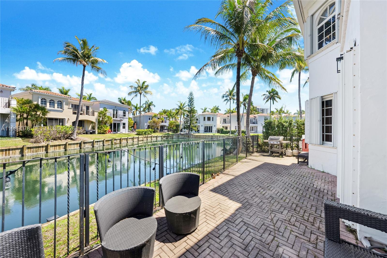Photo of 20765 32nd Ave  (20765), Aventura, Florida, 33180 - Beautiful sunny Florida days can be enjoyed from this expansive patio with water view of canals