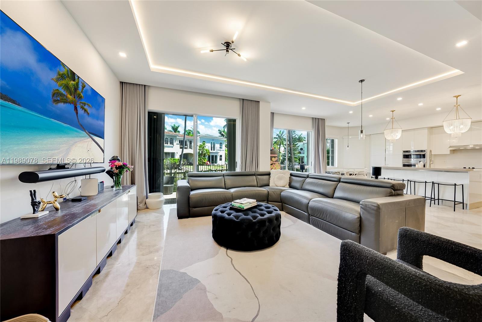 Photo of 20765 32nd Ave  (20765), Aventura, Florida, 33180 - Beautifully updated open concept living room with, high ceilings and LED accent lighting in coveted Aventura Lakes