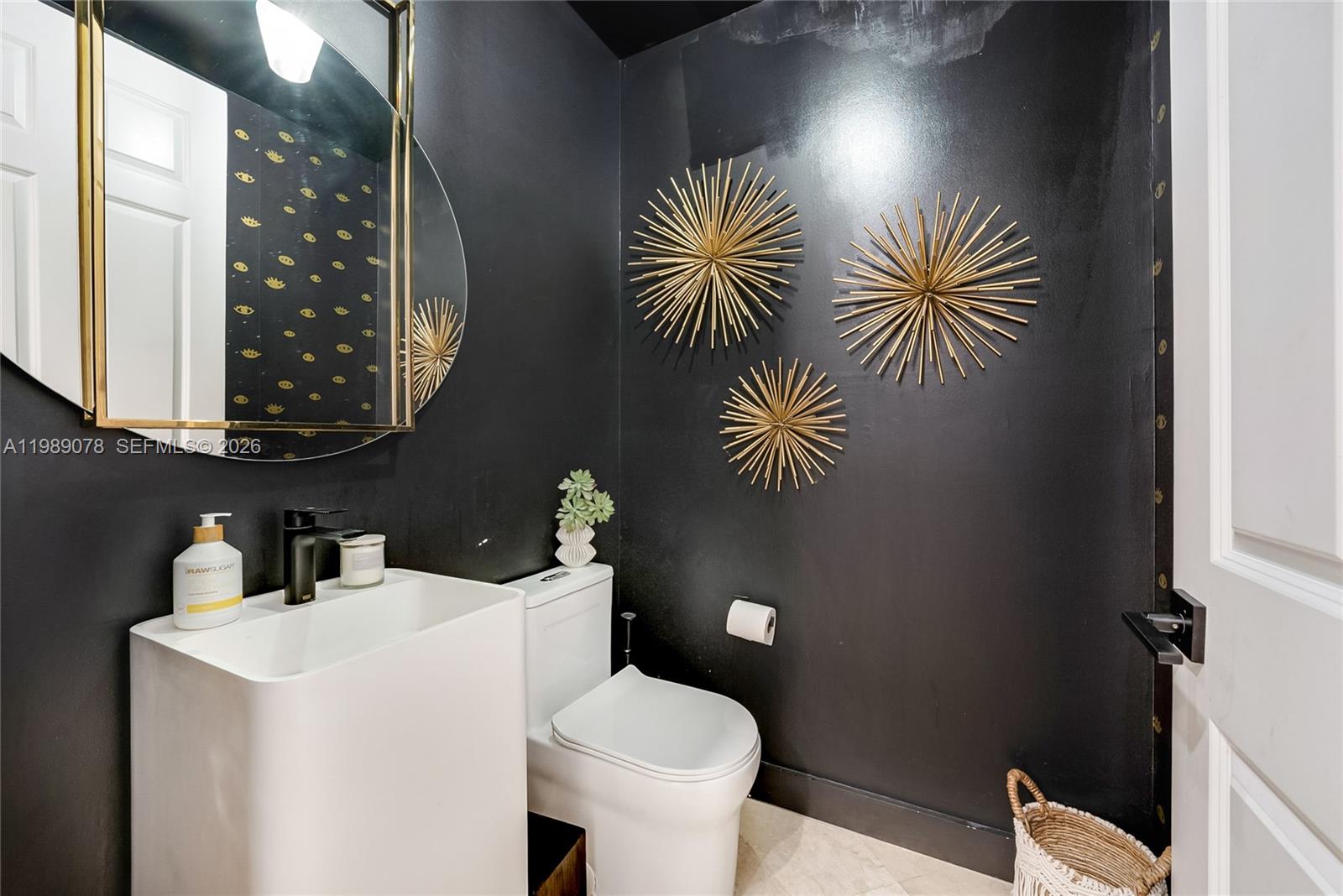 Photo of 20765 32nd Ave  (20765), Aventura, Florida, 33180 - Designer powder room with high end fixtures to welcome your guests