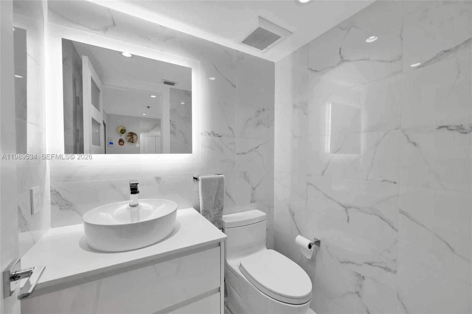 Photo of 10175 Collins Ave #806, Bal Harbour, Florida, 33154 - Powder room