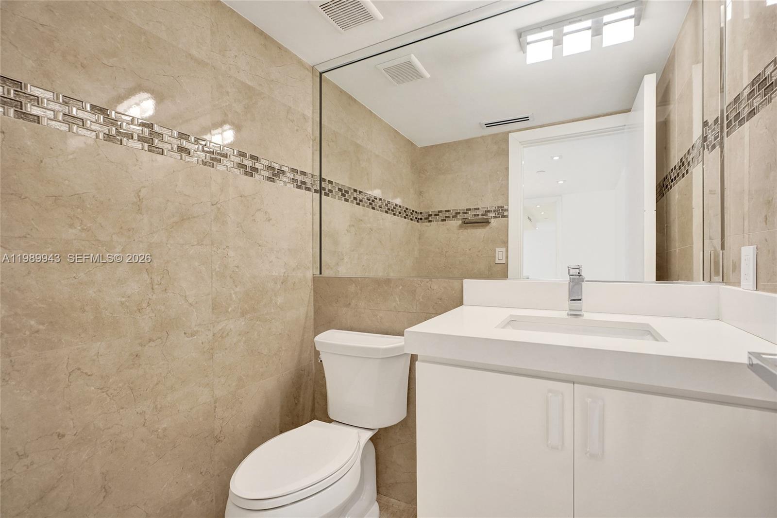 Photo of 10175 Collins Ave  #504, Bal Harbour, Florida, 33154 - GUEST BATHROOM