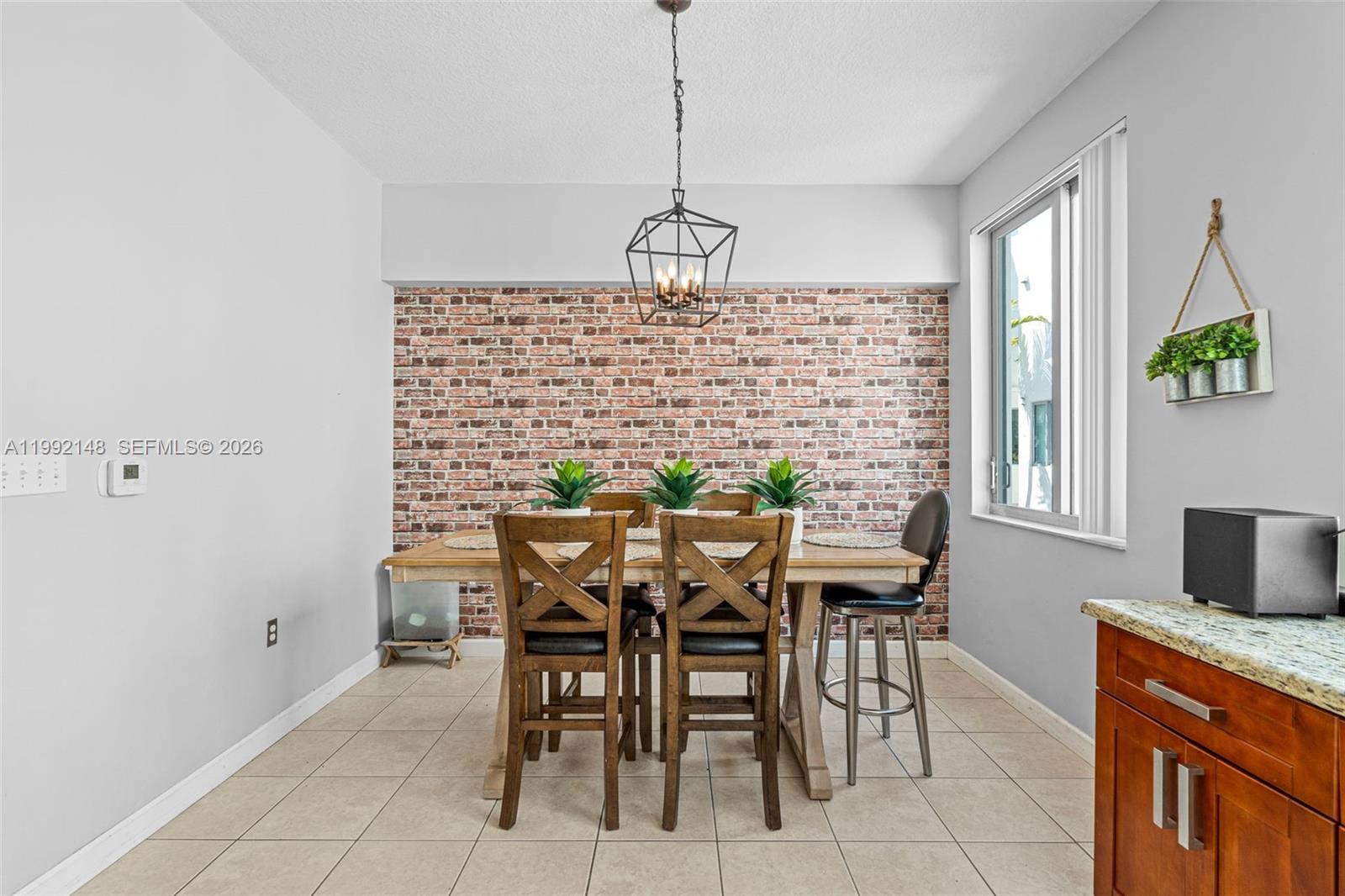 Photo of 2134 Van Buren St (2134), Hollywood, Florida, 33020 - Dining area with accent wall