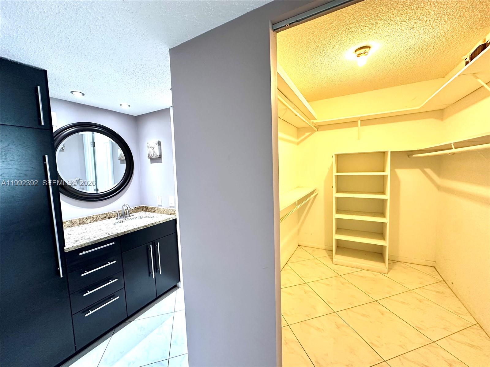 Photo of 1904 Ocean Dr #701, Hallandale Beach, Florida, 33009 - Master Bathroom and Walking Closet