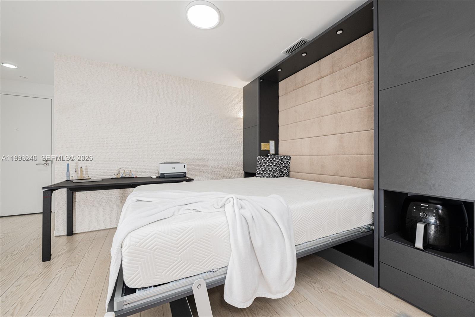 Photo of 2950 188th St  #139, Aventura, Florida, 33180 - Built-in custom made Murphy Queen Size Bed